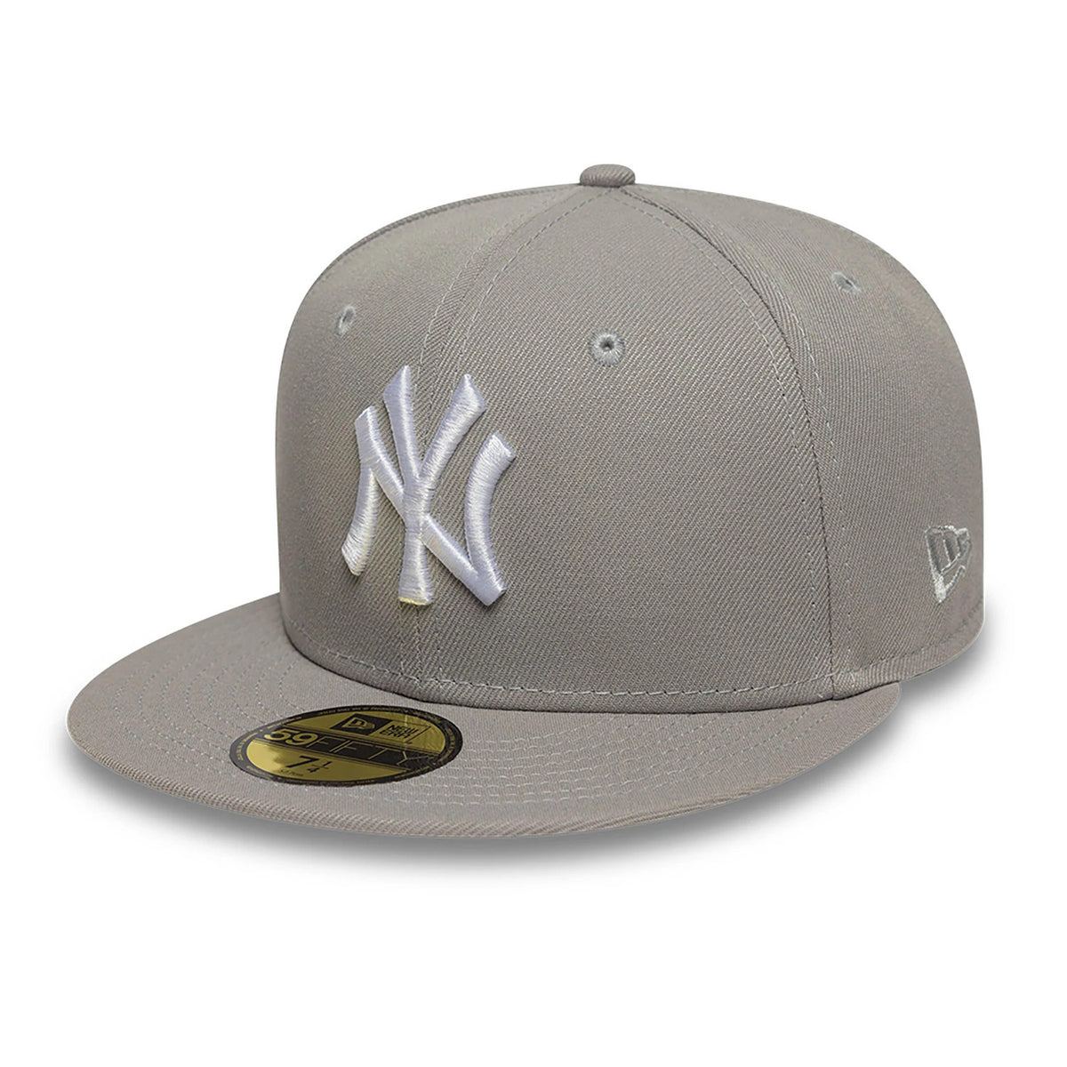 New York Yankees Essential Pack Sidepatch Grey New Era 59FIFTY Fitted Cap, three-quarter view showing the white raised embroidered NY logo on the front panel, grey flat visor with gold 59FIFTY size sticker, and New Era flag logo on the left side.