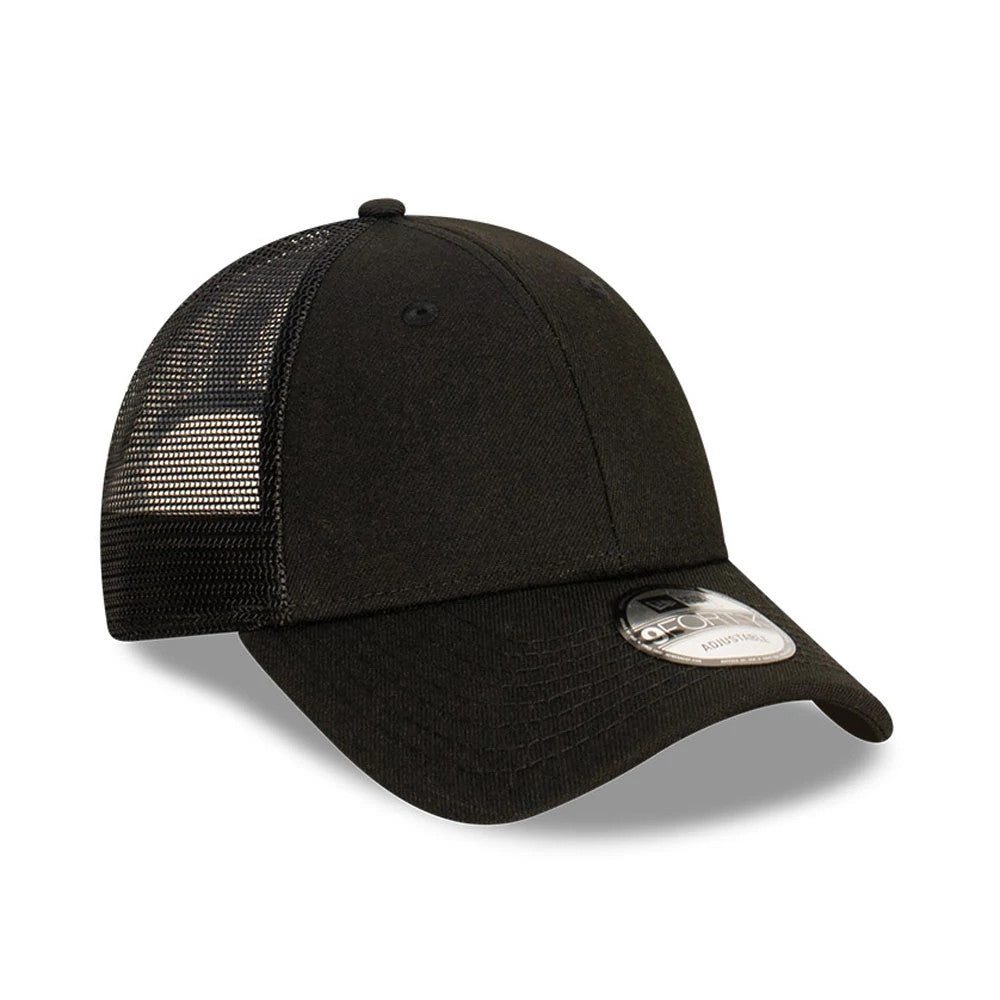 New Era Blank Black 9FORTY Trucker Cap, three-quarter view showing the curved black visor with a 9FORTY size sticker, mesh back panels providing breathability, and a structured front crown with a top button for style and support.