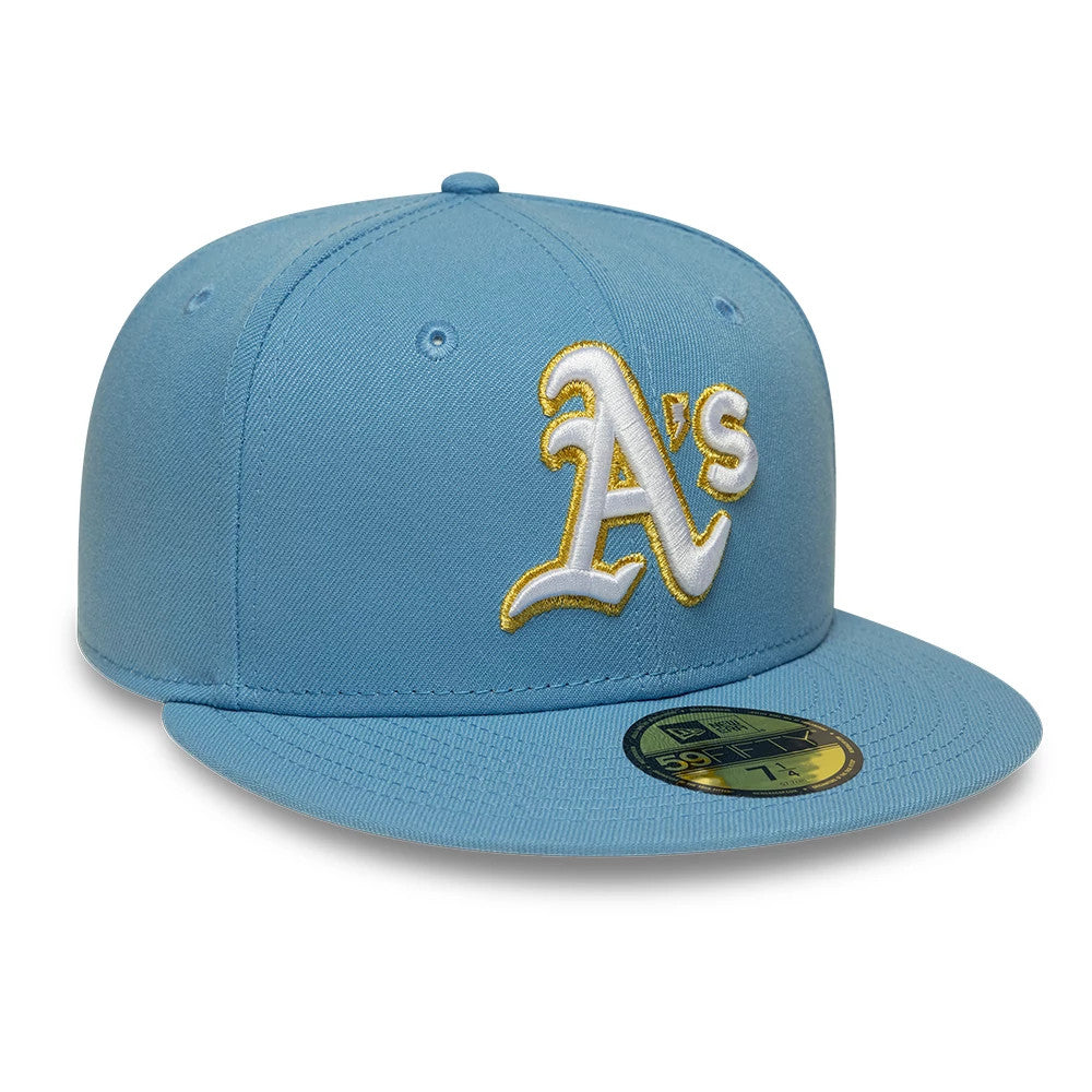 Athletics MLB Pastel Blue New Era 59FIFTY Fitted Cap, front view showing the white and gold embroidered A's logo on the structured pastel blue crown, with a matching flat visor and a gold 59FIFTY size sticker on the visor.