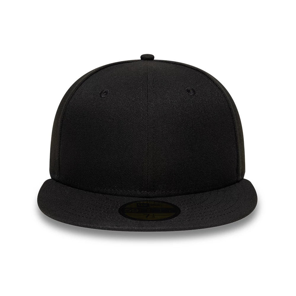 New Era Black 59FIFTY Fitted Cap, front view showing the structured black crown with embroidered eyelets, a matching flat visor, and a centred gold 59FIFTY size sticker on the visor.