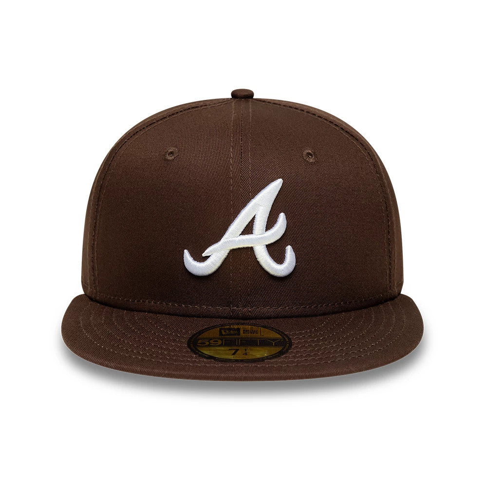 Atlanta Braves MLB Dark Brown New Era 59FIFTY Fitted Cap, front view showing the raised white embroidered A logo on the structured dark brown crown, with a flat visor and a gold 59FIFTY size sticker on the visor.