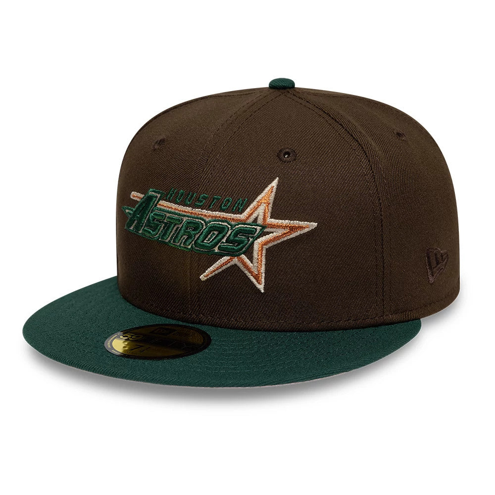 Astros MLB Cooperstown Dark Brown & Dark Green New Era 59FIFTY Fitted Cap, three-quarter view showing raised embroidered Houston Astros logo in green and orange on the front panel, with a green flat visor and gold 59FIFTY size sticker.