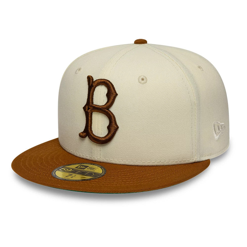 Brooklyn Dodgers MLB Jackie Robinson White New Era 59FIFTY Fitted Cap, three-quarter view showing the brown raised embroidered B logo on the white front panel, brown flat visor with a gold 59FIFTY size sticker, and New Era flag logo on the left side.