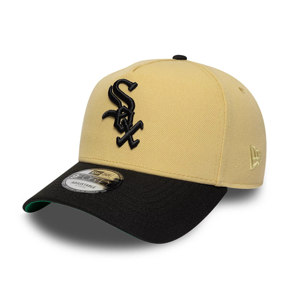 Chicago White Sox MLB Vegas Gold New Era 9FORTY A-Frame Cap, three-quarter view showing a raised black embroidered Sox logo on the front panel, black curved visor with a 9FORTY size sticker, and an embroidered New Era flag on the left side.