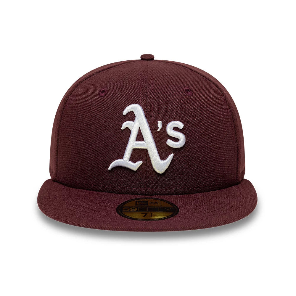 Athletics MLB Dark Purple New Era 59FIFTY Fitted Cap, front view showing a raised white embroidered A's logo centred on the structured dark purple crown with matching visor, complemented by a gold 59FIFTY size sticker on the visor.