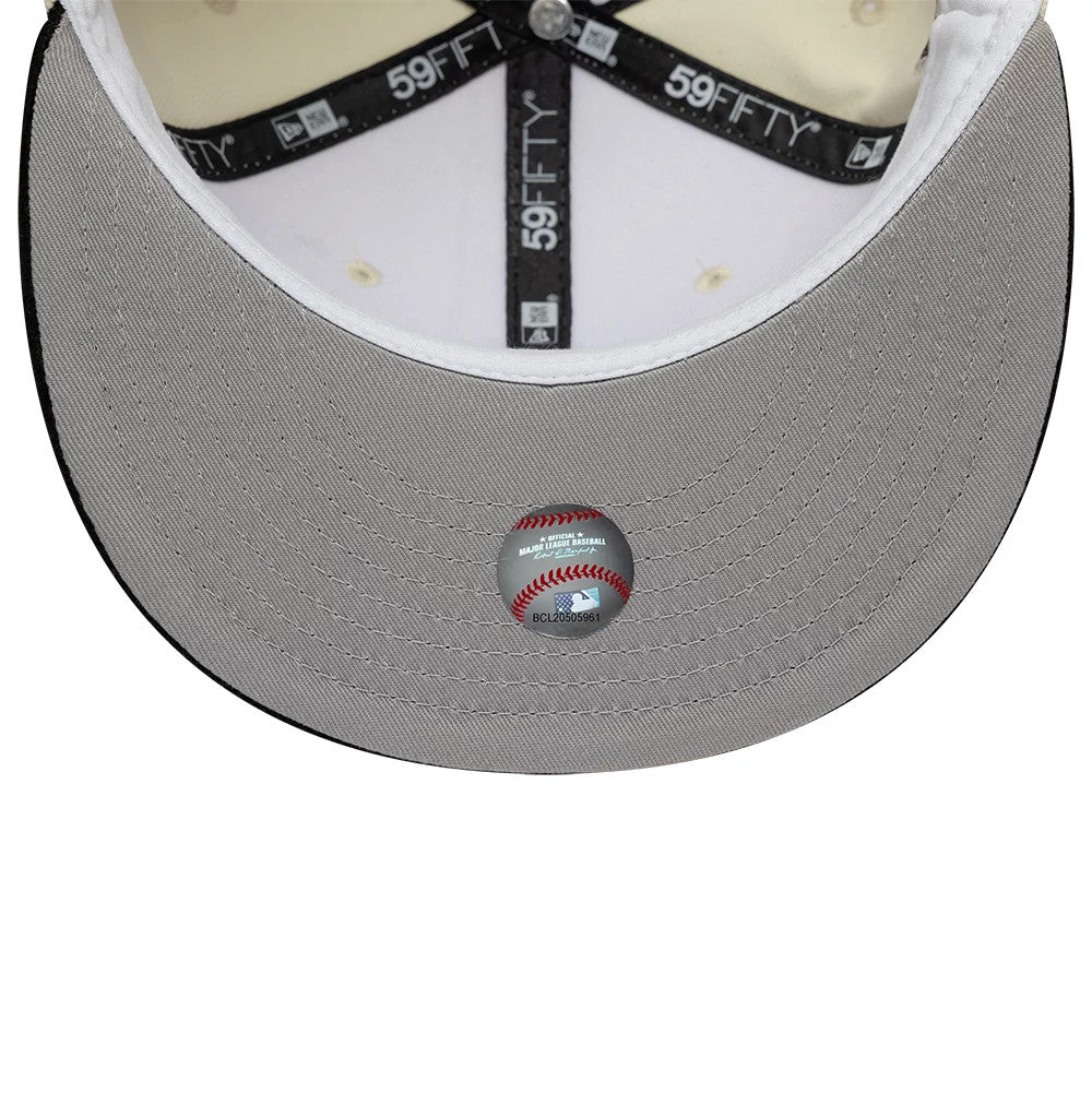 Seattle Mariners MLB Cooperstown White New Era 59FIFTY Fitted Cap, inside view showing the grey undervisor with a holographic baseball sticker, black 59FIFTY taping across the panels, and a white sweatband lining the crown.