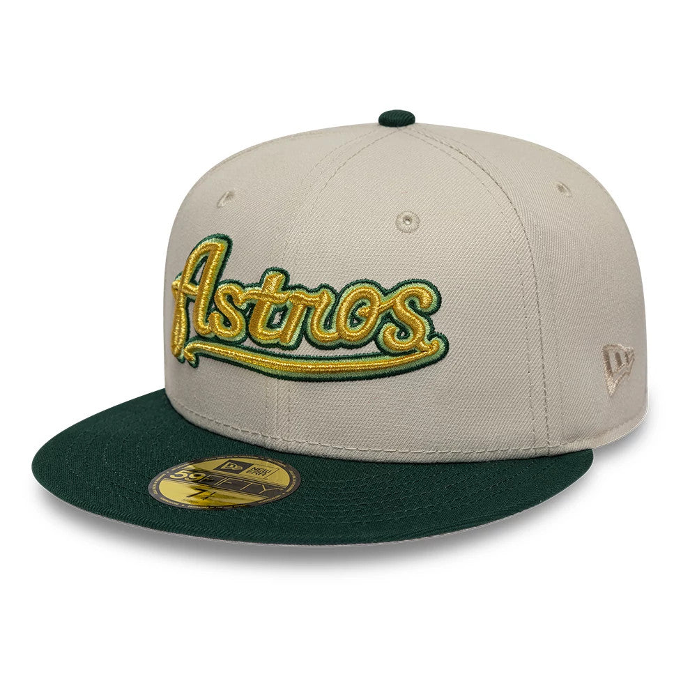 Houston Astros MLB Cooperstown Beige New Era 59FIFTY Fitted Cap, front view showing a raised gold and green embroidered Astros script logo on the front panel, a green flat visor, and a gold 59FIFTY size sticker on the visor.