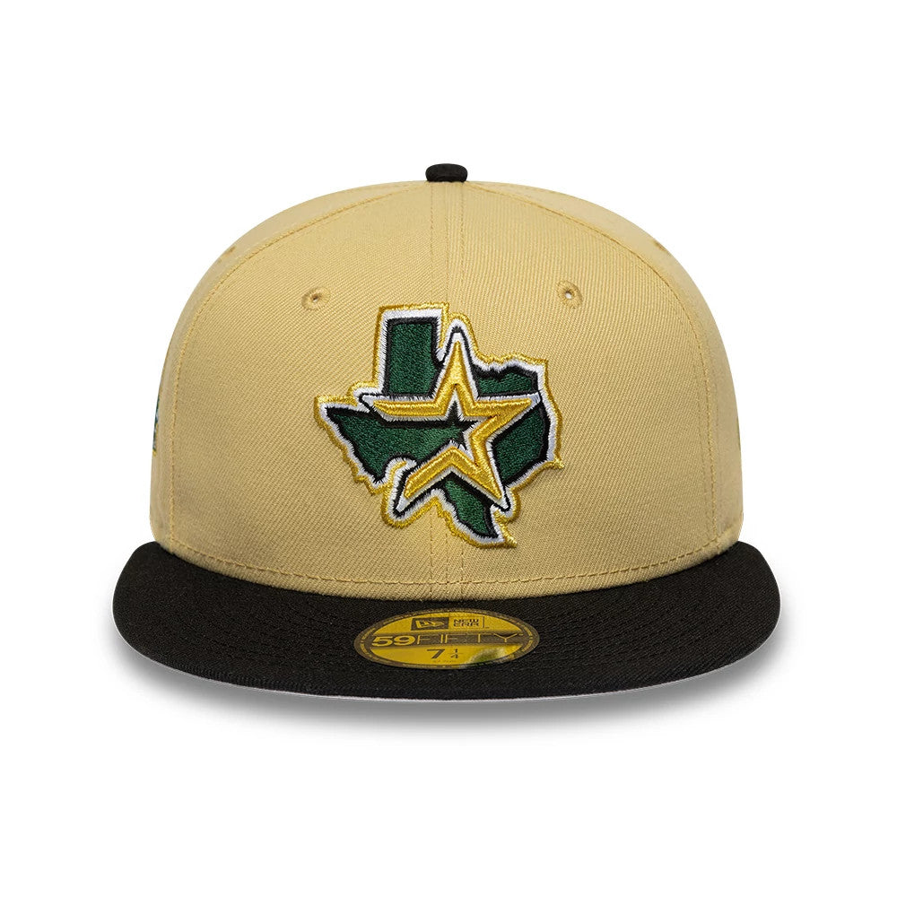 Houston Astros MLB Vegas Gold & Black New Era 59FIFTY Fitted Cap, front view showing a raised green and yellow Texas star logo embroidered on the vegas gold crown, with a contrasting black flat visor and a gold 59FIFTY size sticker on top.