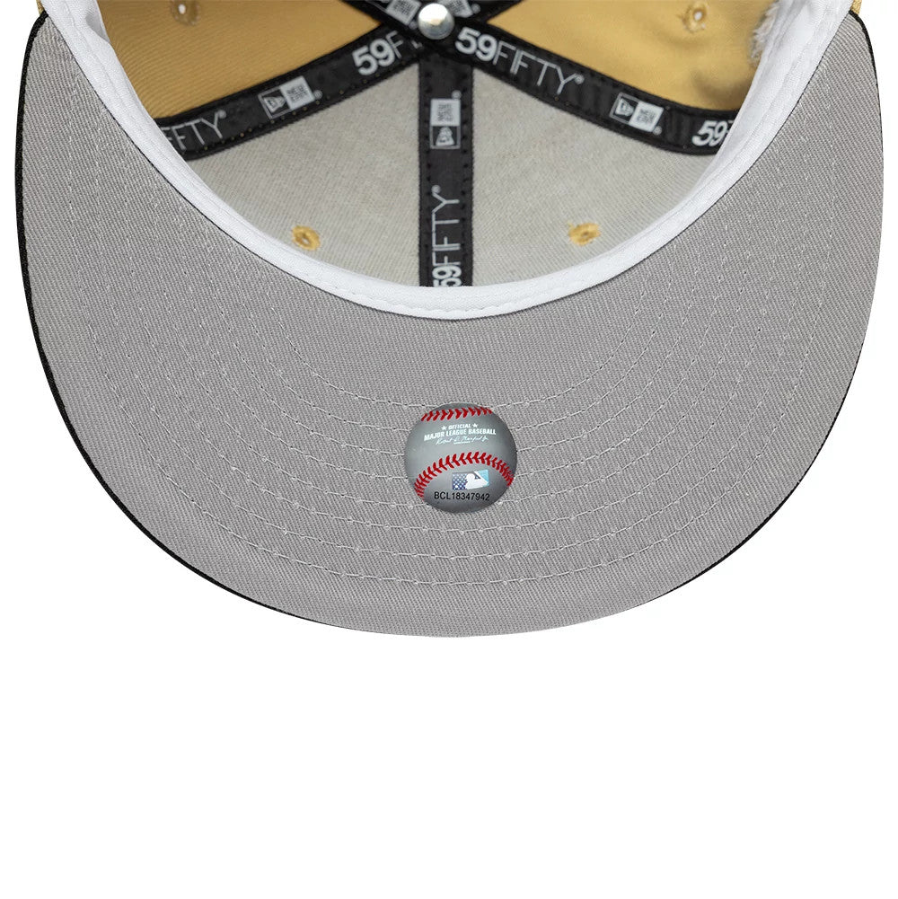 Houston Astros MLB Vegas Gold & Black New Era 59FIFTY Fitted Cap, inside view showing a gold sweatband, black branded taping across the crown, and a grey undervisor with a baseball-themed authenticity sticker at the centre.