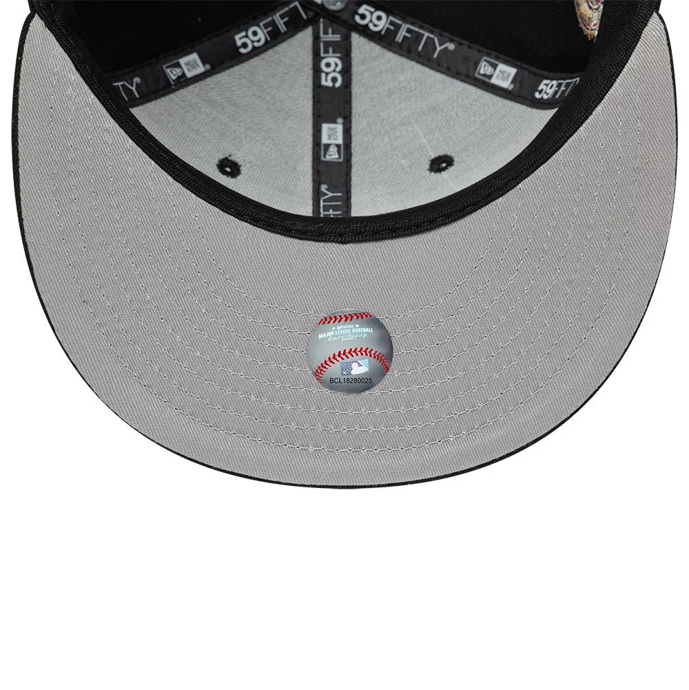 Houston Astros MLB Cooperstown Black New Era 59FIFTY Fitted Cap, inside view showing grey undervisor with a baseball design sticker, black taping featuring white 59FIFTY logos, and black interior eyelets on the crown.