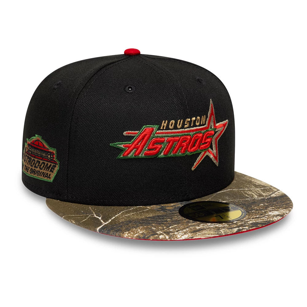 Houston Astros MLB Cooperstown Black New Era 59FIFTY Fitted Cap, front view showing the raised red, green, and gold embroidered Astros logo on the front panel, camouflage-patterned visor, and the 59FIFTY size sticker on the marble-like design.