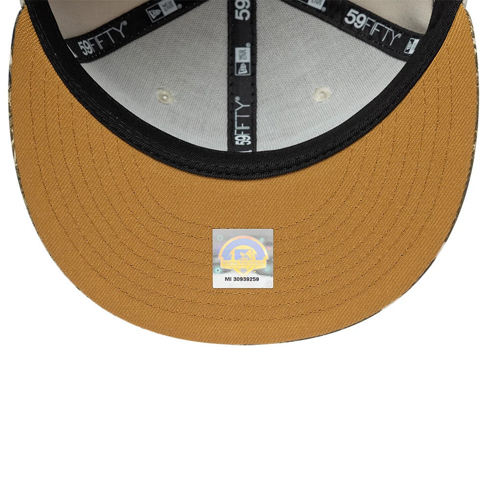 Gwinnett Stripers MiLB Hometown Sidepatch Beige New Era 59FIFTY Fitted Cap, inside view showing black taping with white 59FIFTY logos, a black sweatband, and a holographic sticker on the curved beige undervisor.