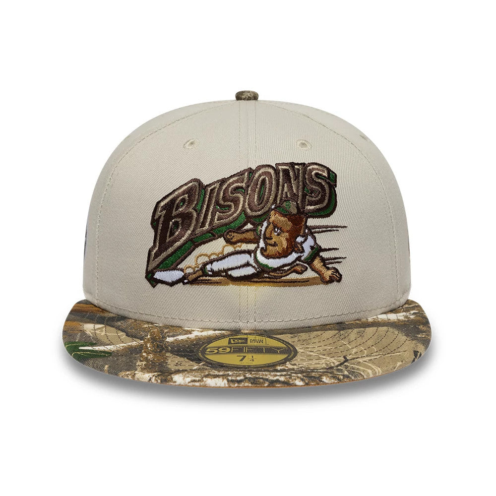 Buffalo Bisons MiLB Hometown Beige New Era 59FIFTY Fitted Cap, front view showing the detailed Bisons graphic in brown and green embroidery on the front panels, with a camouflage-patterned flat visor and a gold 59FIFTY size sticker on the top.