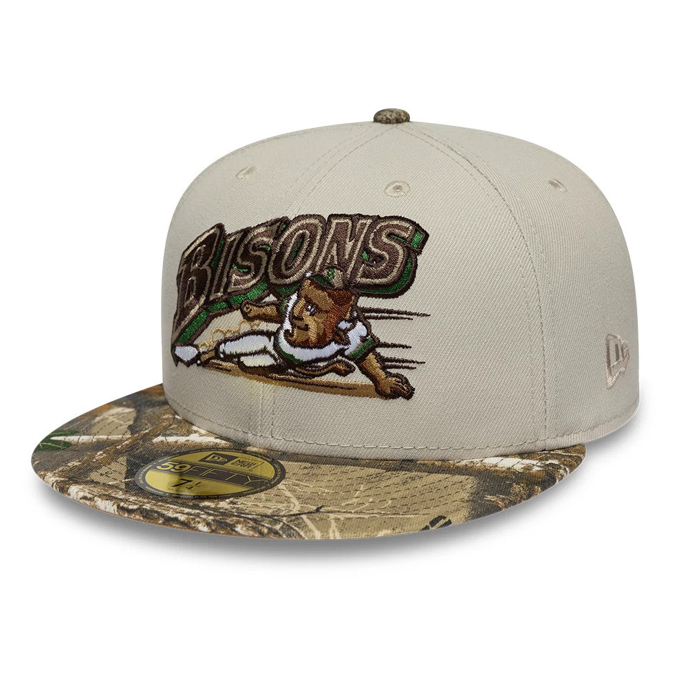 Buffalo Bisons MiLB Hometown Beige New Era 59FIFTY Fitted Cap, front view showing the detailed Bisons logo with an embroidered baseball player in green and brown, a camo-patterned flat visor, and a gold 59FIFTY size sticker on the visor.