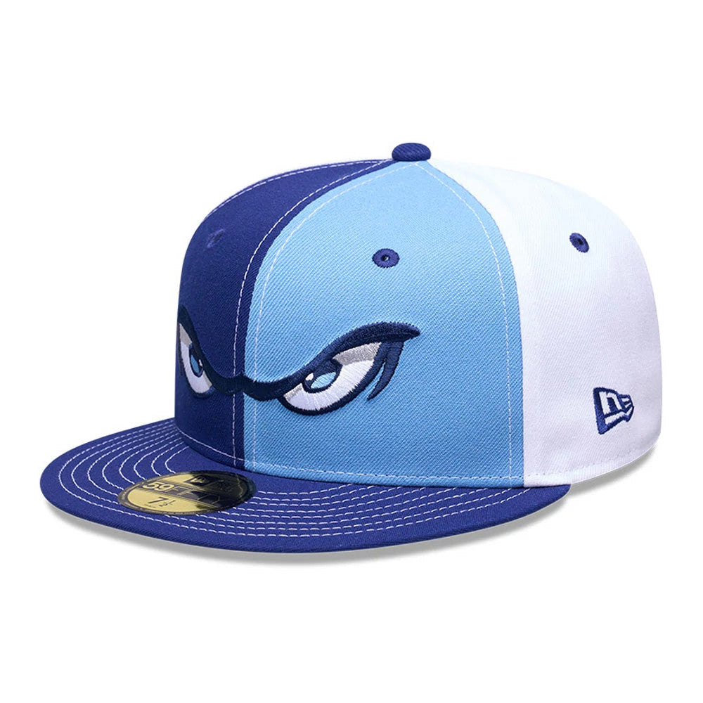 Lake Elsinore Storm MiLB Pinwheel Pastel Blue New Era 59FIFTY Fitted Cap, three-quarter view showing the raised embroidered eyes logo on the multicoloured front panels, a matching blue visor with a gold 59FIFTY size sticker.