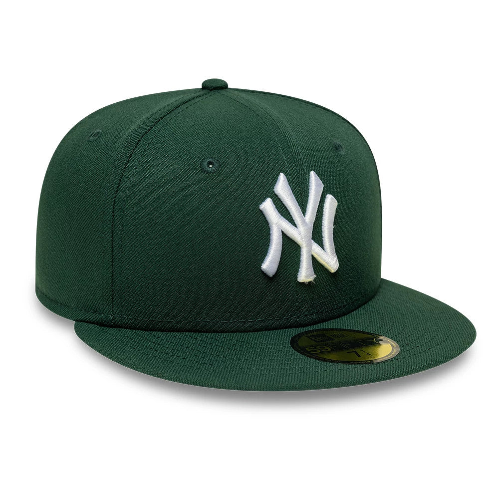 New York Yankees MLB Core Dark Green New Era 59FIFTY Fitted Cap, front view showing a prominent white embroidered NY logo on the structured dark green crown, with a dark green flat visor and a gold 59FIFTY size sticker on the visor.