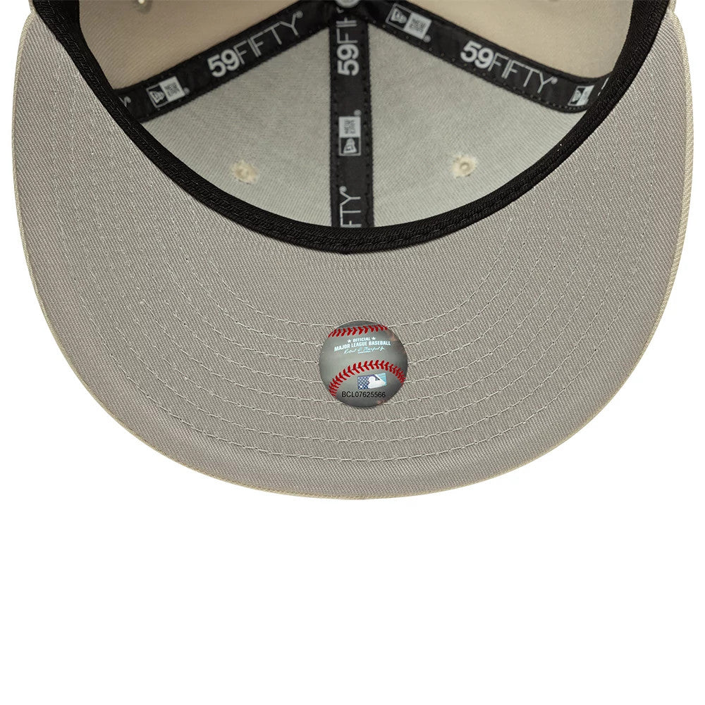 Pictured is this MLB Atlanta Braves 59FIFTY Fitted cap in cream. 2