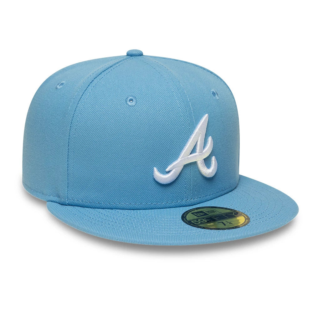 Atlanta Braves MLB Pastel Blue New Era 59FIFTY Fitted Cap, three-quarter view showing the white embroidered A logo on the front panel, a matching pastel blue visor with a gold 59FIFTY size sticker, and embroidered eyelets.