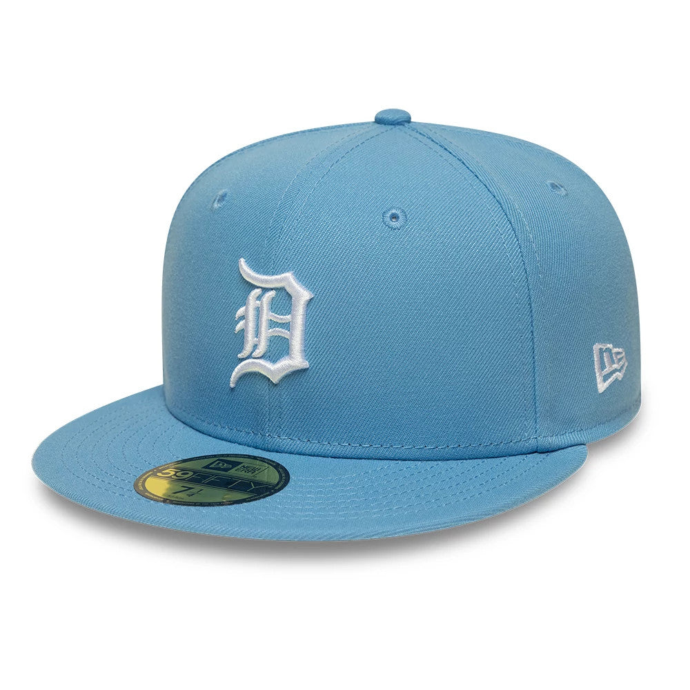 Detroit Tigers MLB Pastel Blue New Era 59FIFTY Fitted Cap, three-quarter view showing the white embroidered D logo on the front panel, a matching blue flat visor with a gold 59FIFTY size sticker, and the New Era flag logo on the left side.