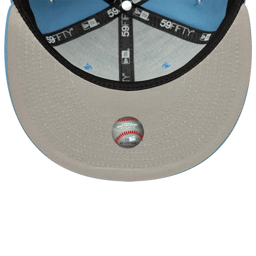 Detroit Tigers MLB Pastel Blue New Era 59FIFTY Fitted Cap, inside view showing the grey undervisor with a baseball sticker, black taping with 59FIFTY branding, and a light blue sweatband lining the interior of the structured crown.