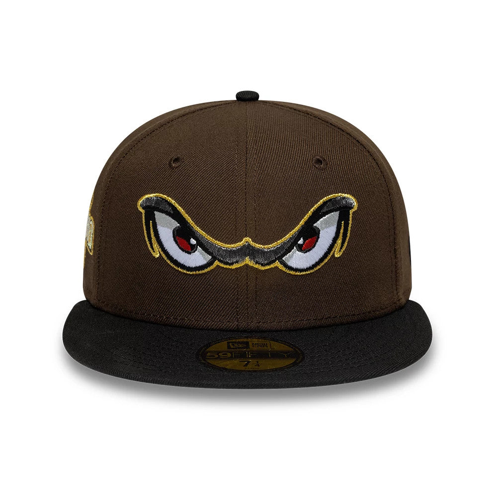 Lake Elsinore Storm MiLB Pinwheel Dark Brown & Black New Era 59FIFTY Fitted Cap, front view showing large embroidered eyes with red pupils on the brown front panel, a black flat visor, and a gold 59FIFTY size sticker.