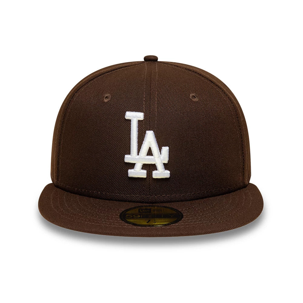 LA Dodgers MLB Dark Brown New Era 59FIFTY Fitted Cap, front view showing a white embroidered LA logo on the structured dark brown crown, with a matching flat visor and a gold 59FIFTY size sticker on the visor.