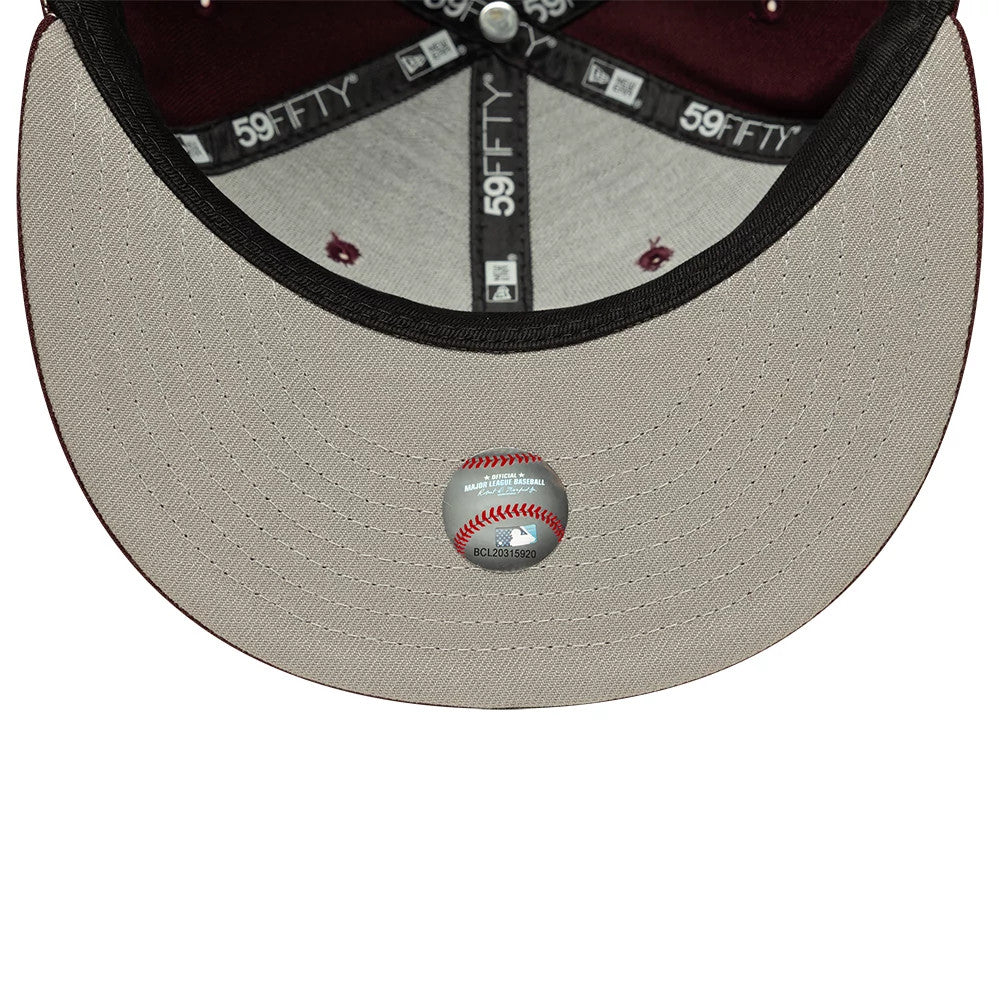 Chicago White Sox MLB Dark Purple New Era 59FIFTY Fitted Cap, inside view showing grey undervisor with an MLB sticker, black sweatband and 59FIFTY taping, and dark purple eyelets on the structured crown.