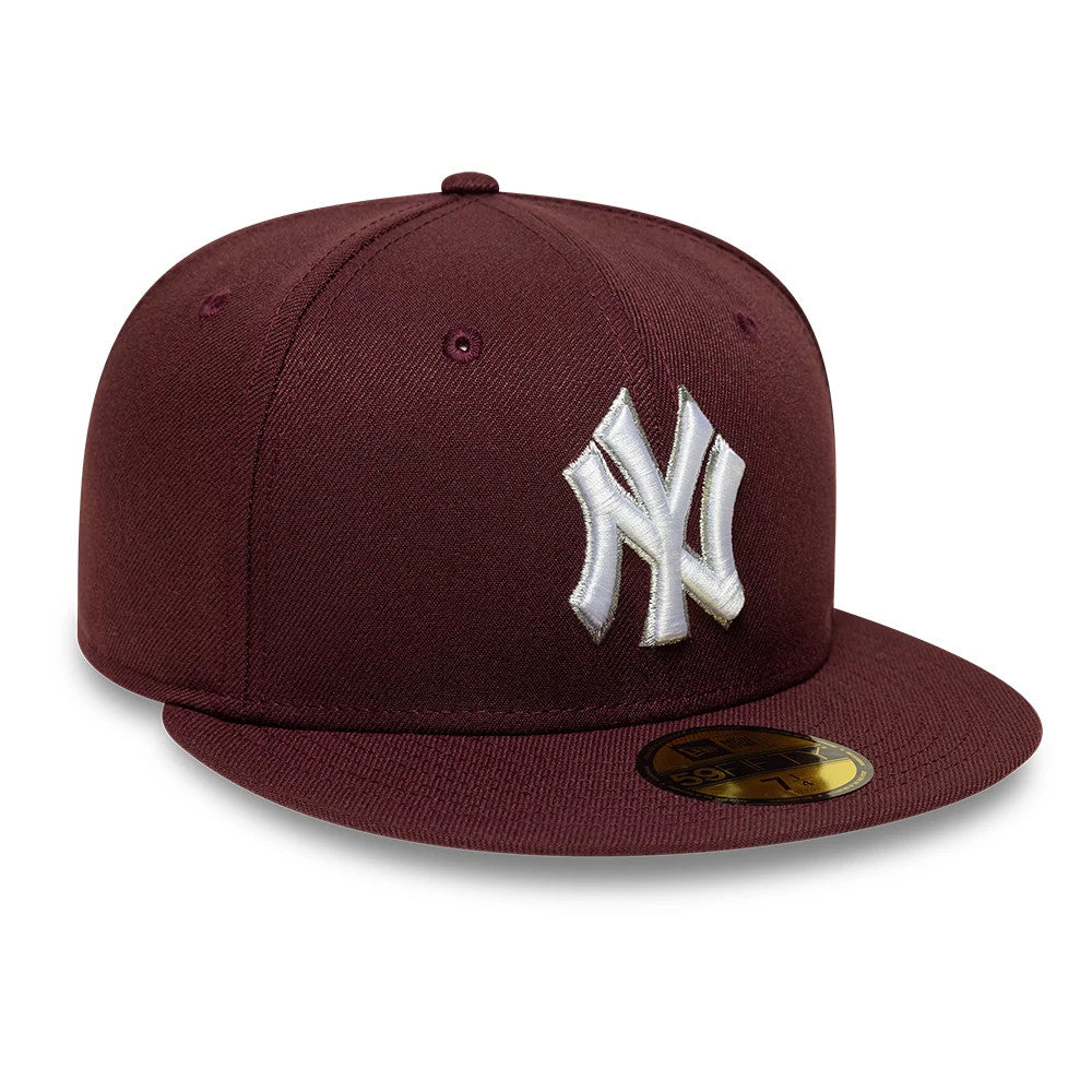 New York Yankees MLB Dark Purple New Era 59FIFTY Fitted Cap, three-quarter view showing the raised white embroidered NY logo on the front panel, complemented by a matching dark purple flat visor and a gold 59FIFTY size sticker.