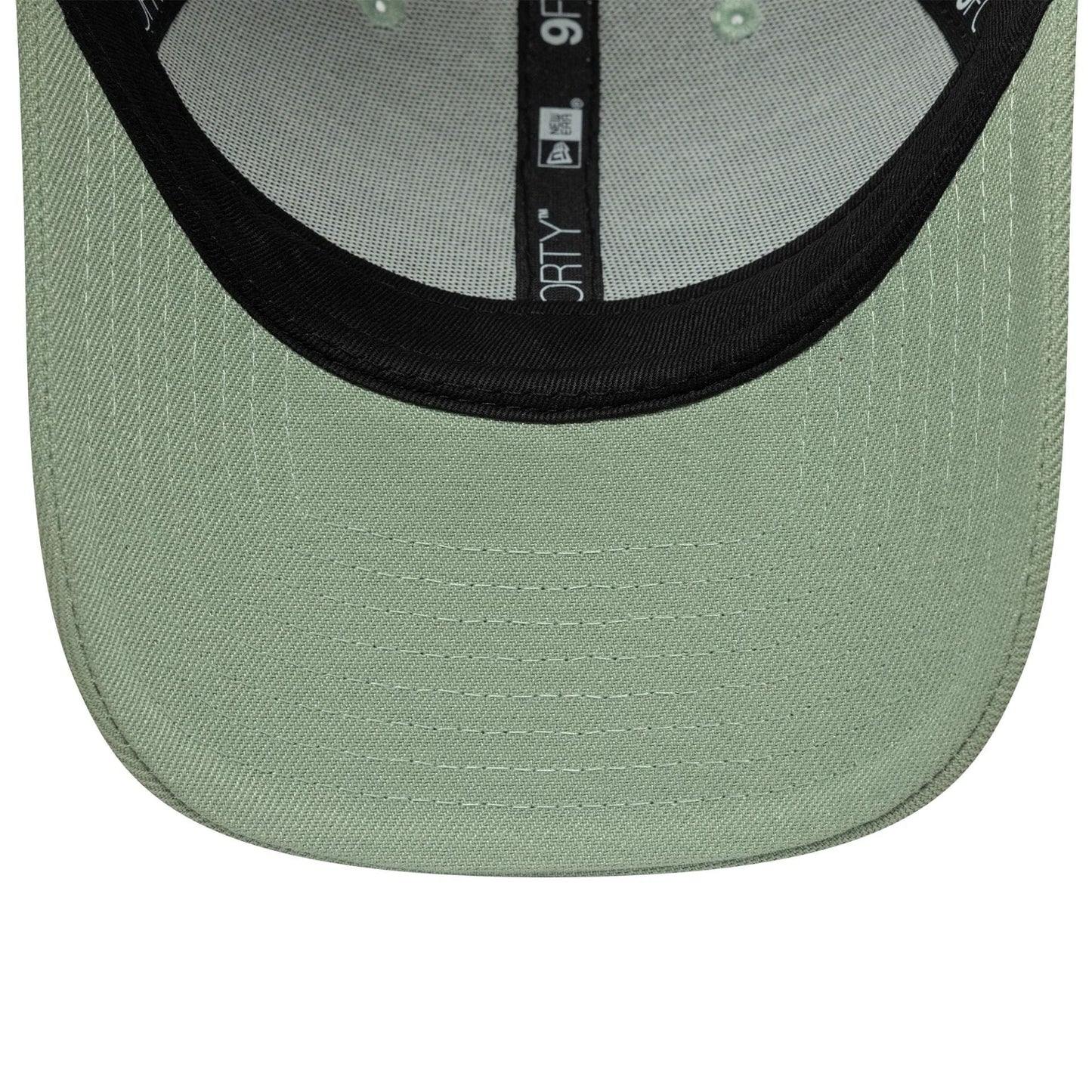 This is a New Era Green 9FORTY Trucker Adjustable Cap 7