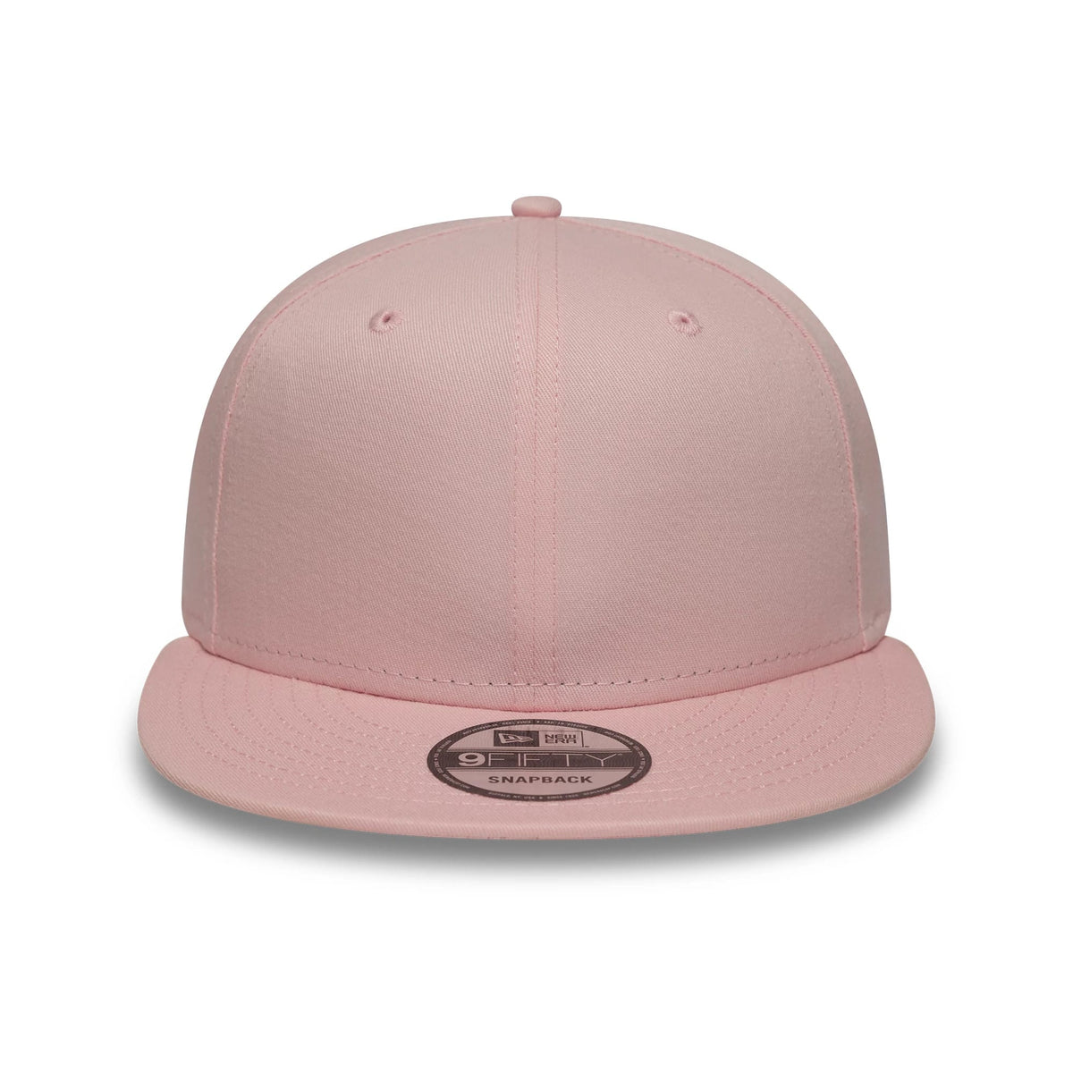 New Era Pink 9FIFTY Snapback Adjustable Cap, front view showing the pink tone across the structured crown with embroidered eyelets, a matching flat visor, and a New Era 9FIFTY size sticker on the visor.