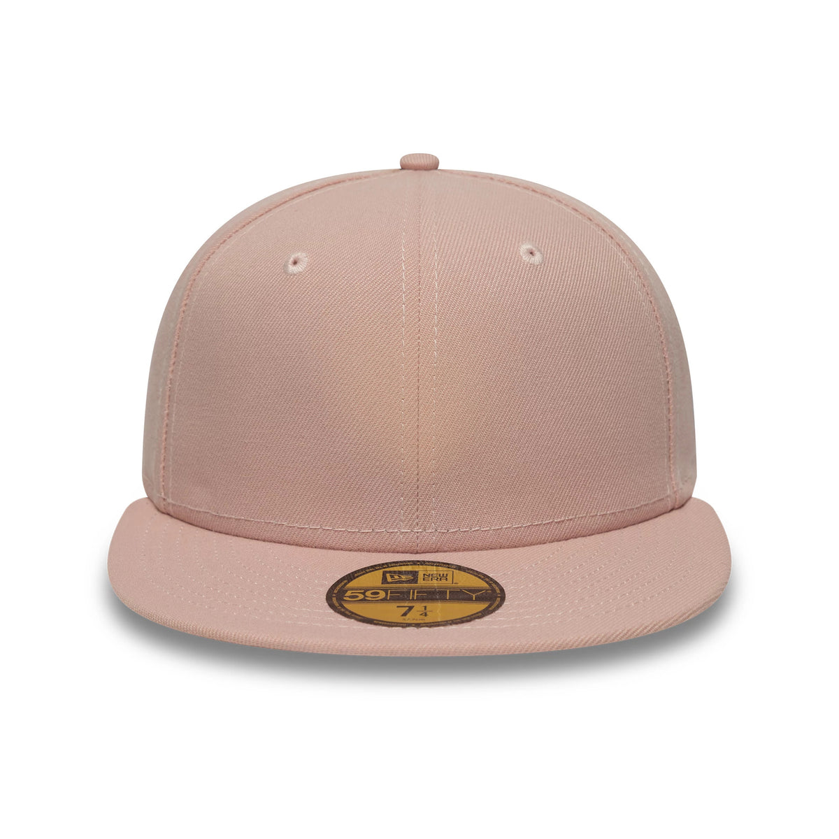 New Era Blank Pink 59FIFTY Fitted Cap, front view showing the seamless pink front panels with eyelets, a matching pink flat visor, and a gold 59FIFTY size sticker centred on the visor.