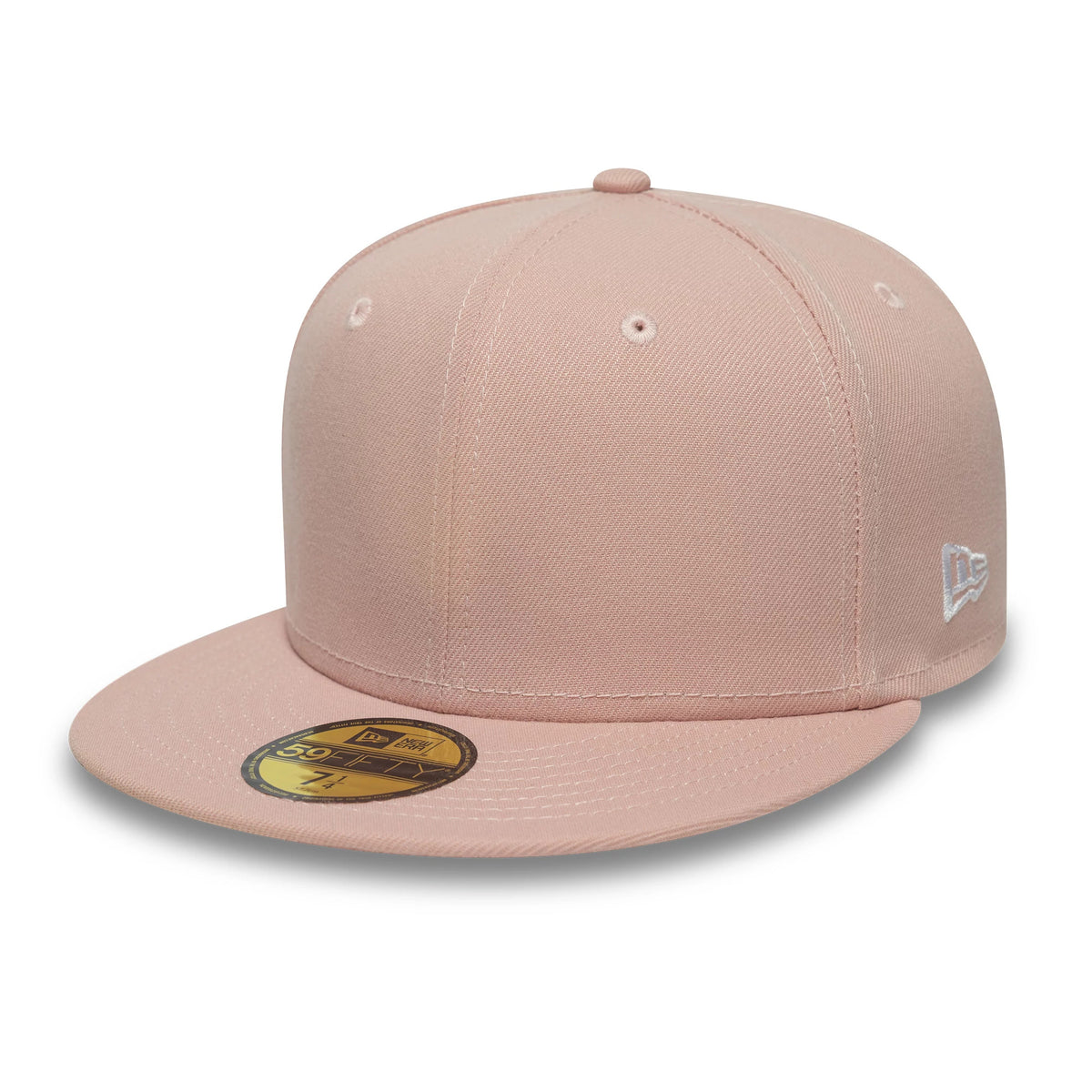 New Era Blank Pink 59FIFTY Fitted Cap, three-quarter view showing the pink structured crown with embroidered eyelets, complemented by a matching flat pink visor adorned with a gold 59FIFTY size sticker, and a white New Era flag logo on the left side.