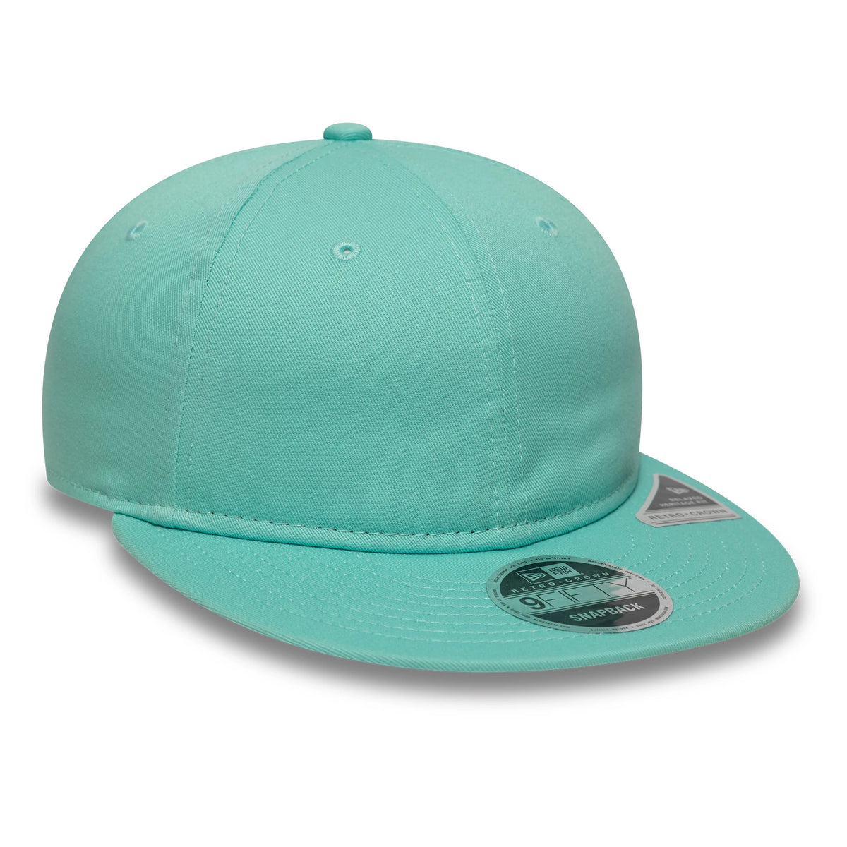 New Era Turquoise Retro Crown 9FIFTY Snapback Adjustable Cap, three-quarter view showing the turquoise crown with embroidered eyelets, a flat turquoise visor featuring a 9FIFTY size sticker, and a contrasting New Era flag logo on the side.