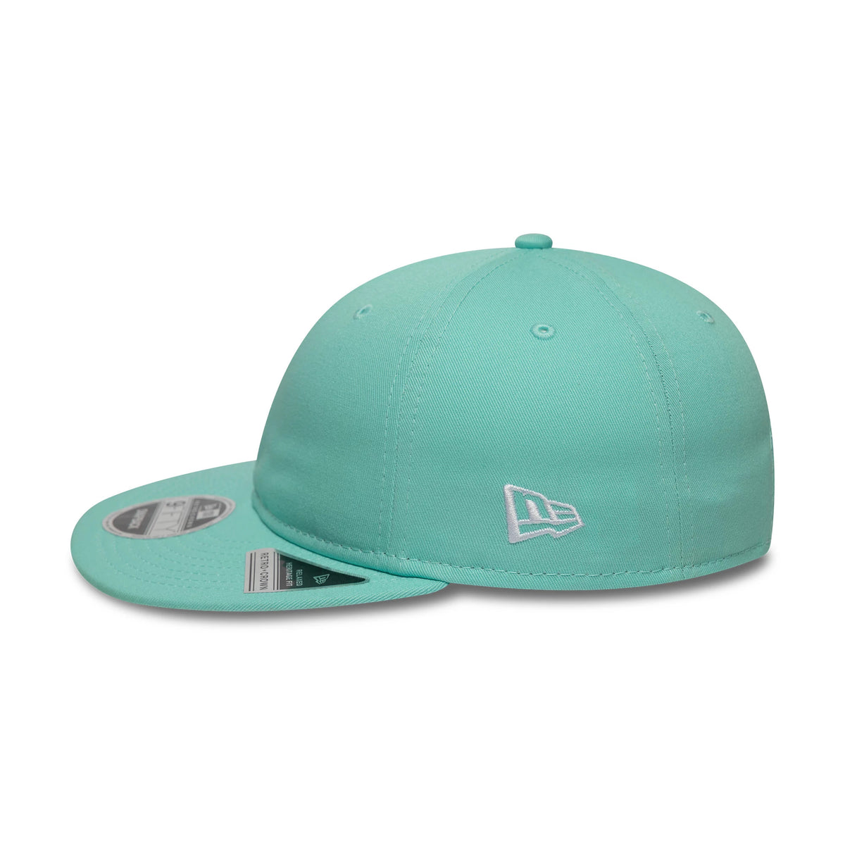 New Era Turquoise Retro Crown 9FIFTY Snapback Adjustable Cap, side view showing the white embroidered New Era flag logo on the left side, with a flat turquoise visor and the black and silver 9FIFTY size sticker on the visor.