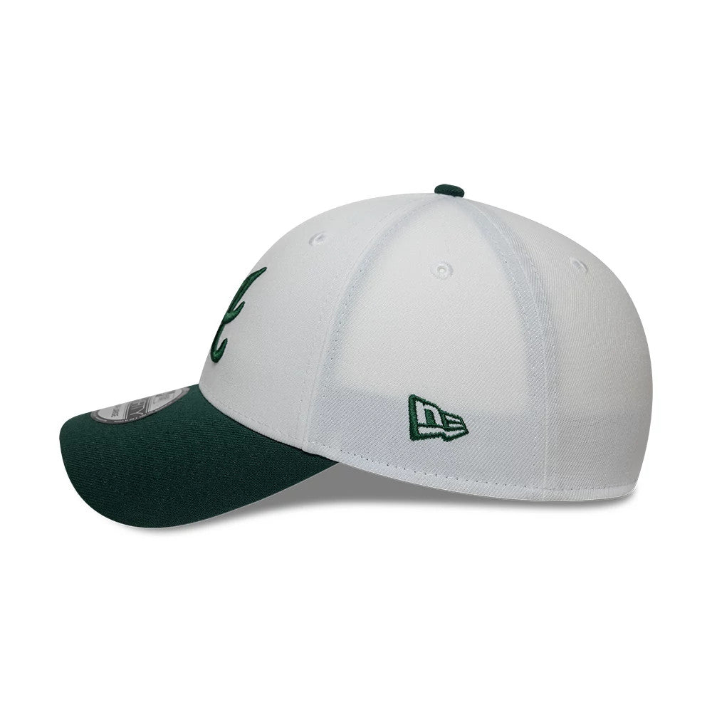 Atlanta Braves MLB White New Era 39THIRTY Stretch Fit Cap, side view showing the dark green embroidered New Era flag logo on the left side, the structured white crown with green A lettering, and a green curved visor with a 39THIRTY size sticker.