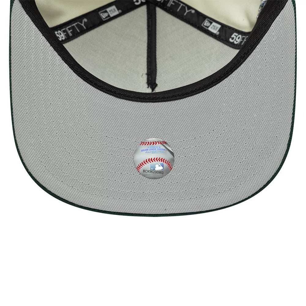 LA Dodgers MLB Cream New Era 59FIFTY A-Frame Fitted Cap, inside view showing black branded taping on the crown seams, a grey undervisor with a Major League Baseball holographic sticker in the centre, and a beige sweatband.
