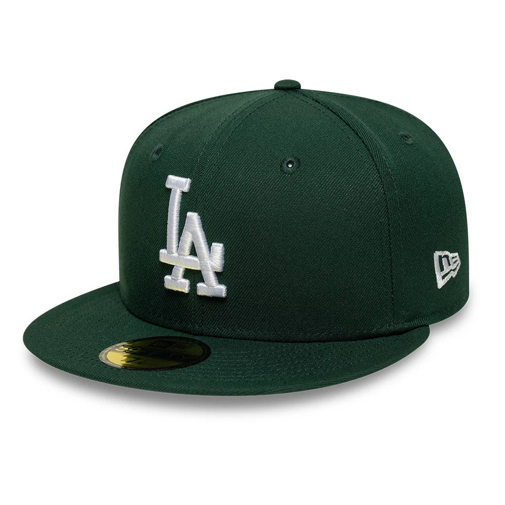 LA Dodgers MLB Dark Green New Era 59FIFTY Fitted Cap, three-quarter view showing a white raised embroidered LA logo on the front panel, a flat dark green visor with a gold 59FIFTY size sticker, and New Era flag logo on the left side.