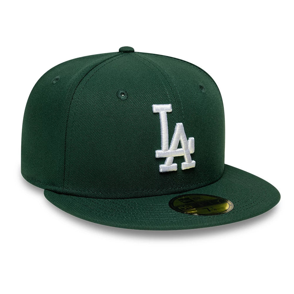 LA Dodgers MLB Dark Green New Era 59FIFTY Fitted Cap, front view showing the white embroidered LA logo on the structured dark green crown, with a matching dark green flat visor and a gold 59FIFTY size sticker on the visor.