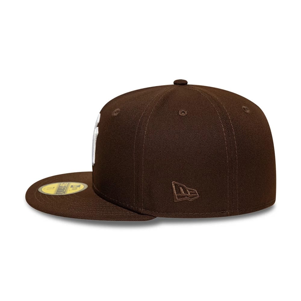 Pictured is this MLB New York Yankees 59FIFTY Fitted cap in dark brown. 7