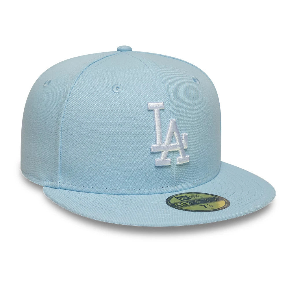 LA Dodgers MLB Pastel Blue New Era 59FIFTY Fitted Cap, front view showing the raised white embroidered LA logo on the front panel, a matching pastel blue flat visor, and the gold 59FIFTY size sticker on the visor's top.