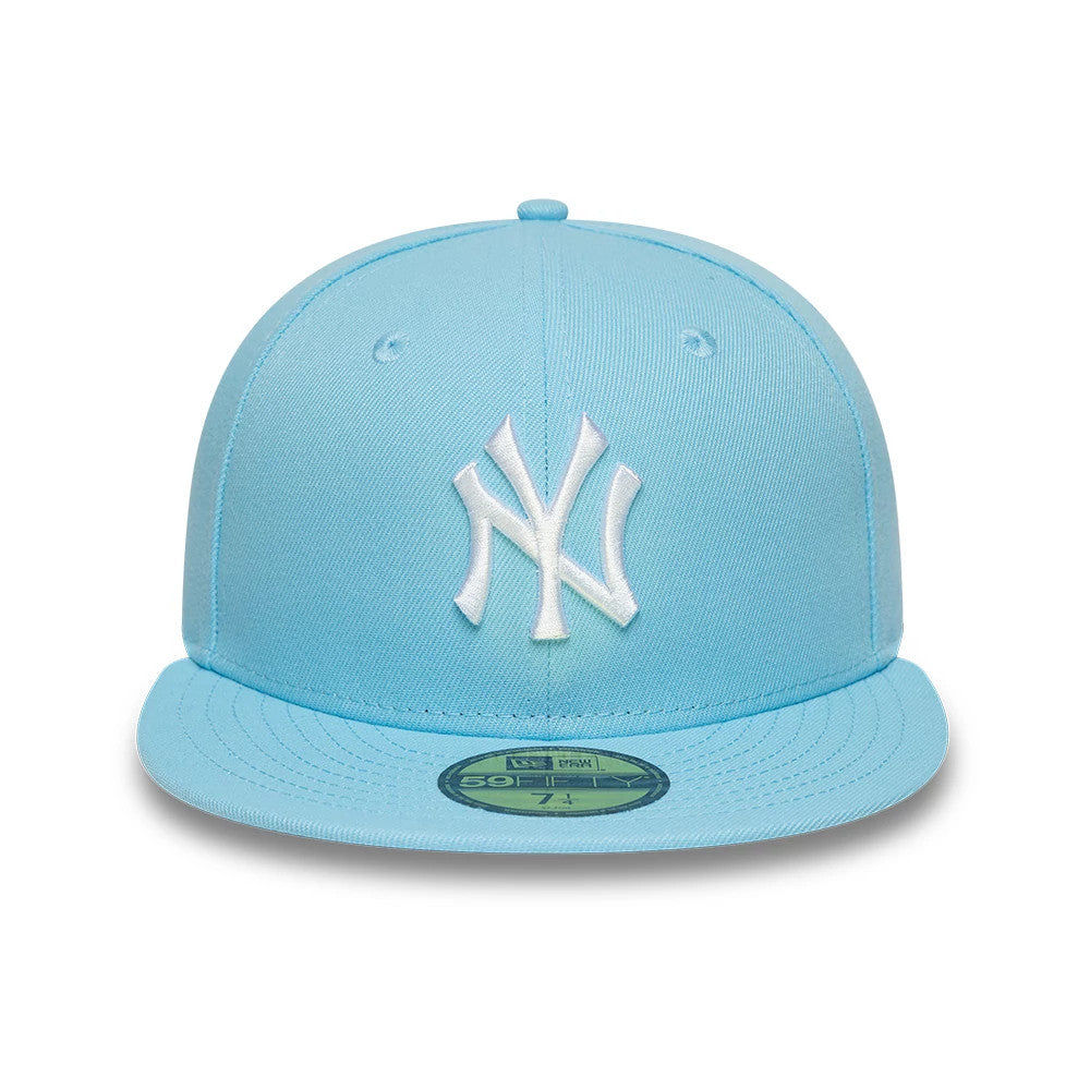 New York Yankees MLB Pastel Blue New Era 59FIFTY Fitted Cap, front view showing a raised white embroidered NY logo on the structured pastel blue crown, a matching visor with stitching details, and a gold 59FIFTY size sticker on the rim.