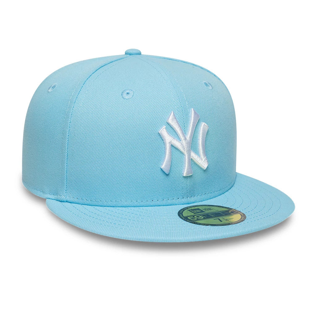 New York Yankees MLB Pastel Blue New Era 59FIFTY Fitted Cap, front view showing the white raised embroidered NY logo on the front panel, with a matching pastel blue flat visor and a gold 59FIFTY size sticker on the visor.
