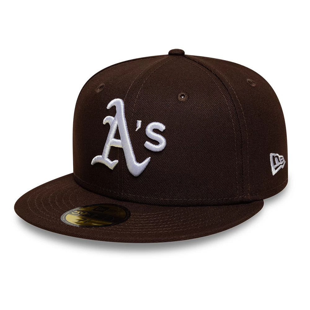 Athletics MLB Dark Brown New Era 59FIFTY Fitted Cap, front view showing the white raised embroidered A's logo on the structured dark brown crown, with a flat brown visor and a gold 59FIFTY size sticker underneath.