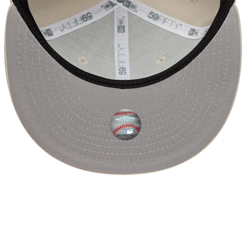 Pictured is this MLB Athletics 59FIFTY Fitted cap in beige. 2