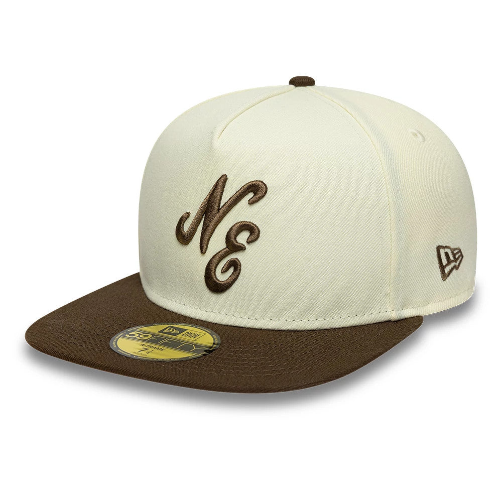 New Era Cream 59FIFTY A-Frame Fitted Cap, front view showing the brown raised embroidered NE logo on the cream front panel, brown flat visor with a gold 59FIFTY size sticker, and New Era flag logo on the left side.