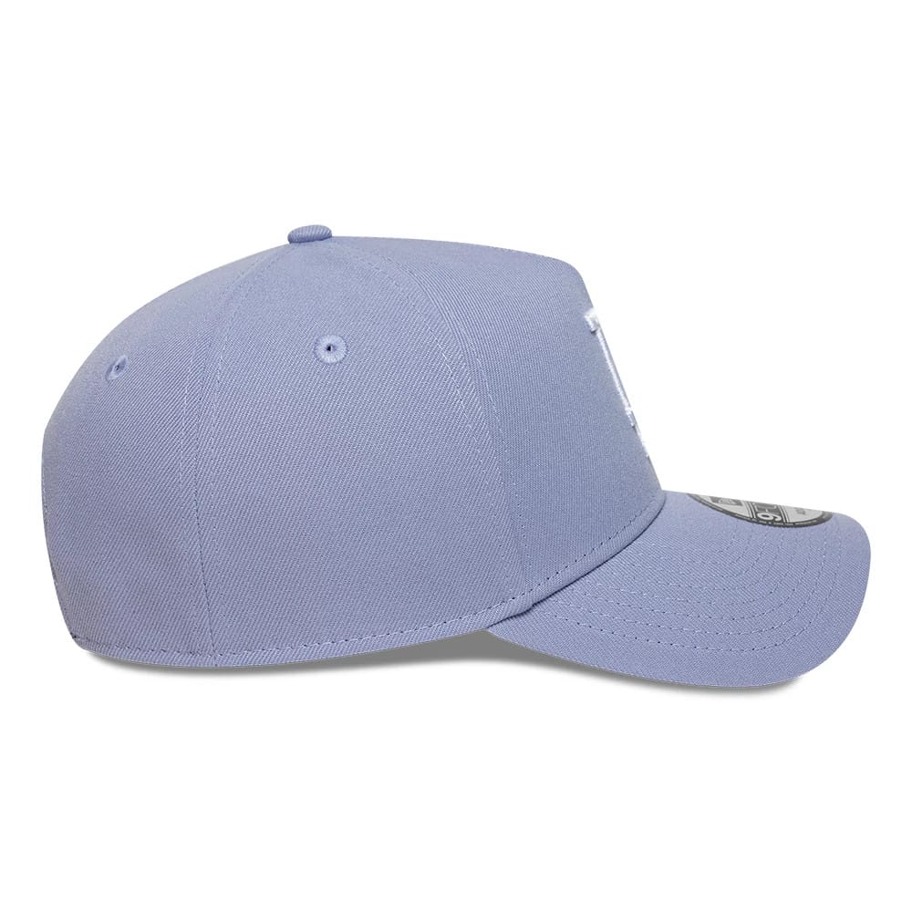 LA Dodgers MLB Pastel Purple New Era 9FORTY A-Frame Adjustable Cap, side view showing the white embroidered LA logo on the structured crown, with a rounded visor and 9FORTY size sticker on the pastel purple fabric.