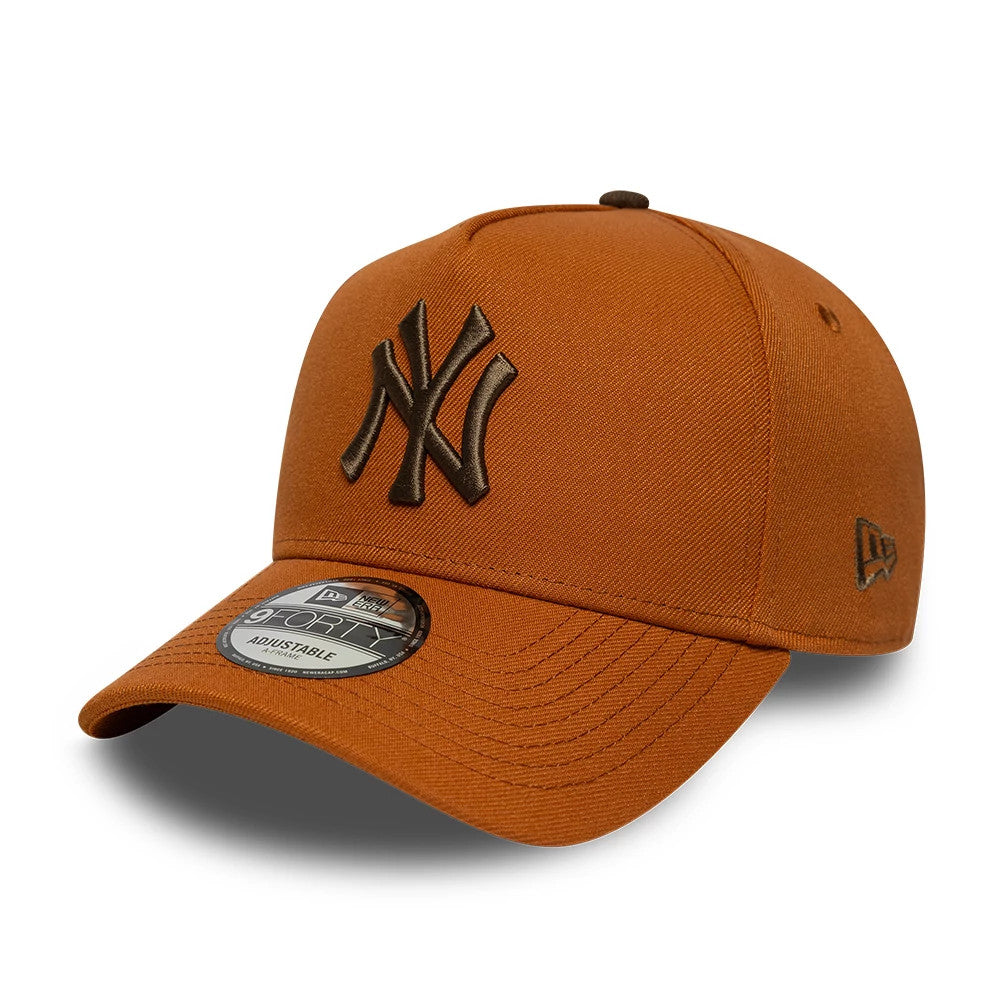 New York Yankees MLB Brown New Era 9FORTY A-Frame Adjustable Cap, front view showing a raised brown embroidered NY logo on the structured brown crown, a curved visor with a 9FORTY size sticker, and the New Era flag logo on the left side.