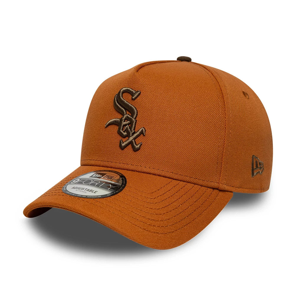 Chicago White Sox MLB Brown New Era 9FORTY A-Frame Adjustable Cap, three-quarter view showing the raised brown embroidered Sox logo on the front panel, curved brown visor with a 9FORTY size sticker, and New Era flag logo on the left side.