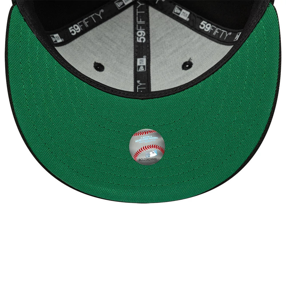Atlanta Braves MLB Black New Era 59FIFTY Fitted Cap, inside view showing the grey sweatband and black seam taping with white logos, complemented by a green undervisor with a baseball graphic sticker centrally placed near the edge.