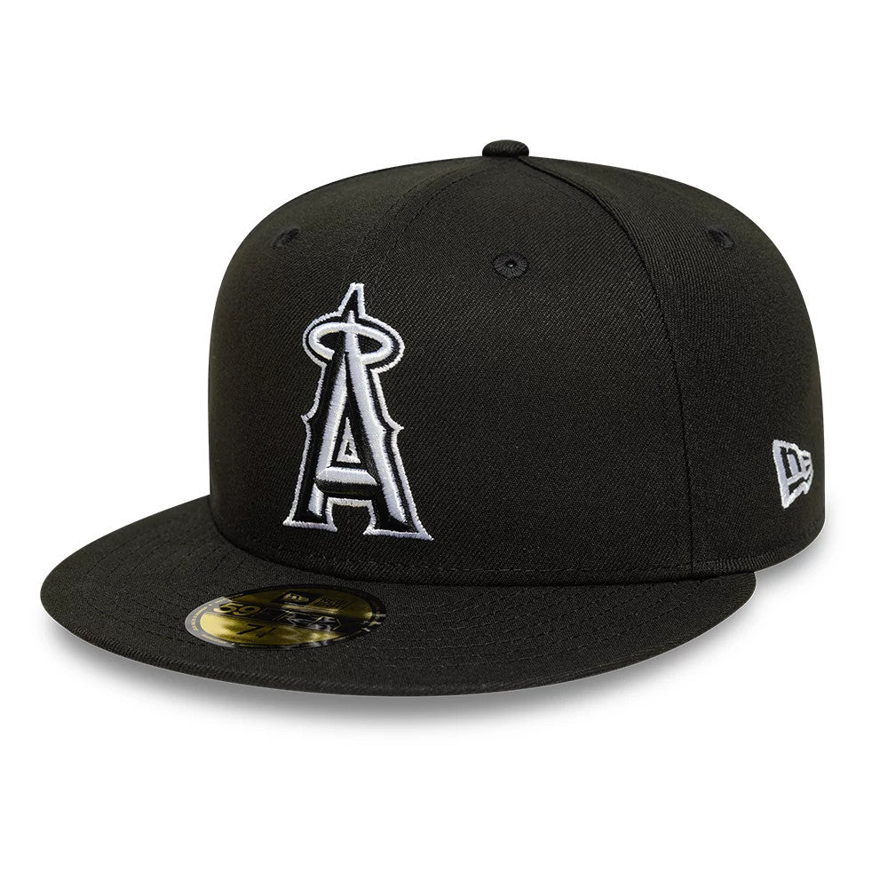 LA Angels MLB Black New Era 59FIFTY Fitted Cap, three-quarter view showing the raised white embroidered LA logo on the front panel, a flat black visor with a gold 59FIFTY size sticker, and the New Era flag logo on the left side.